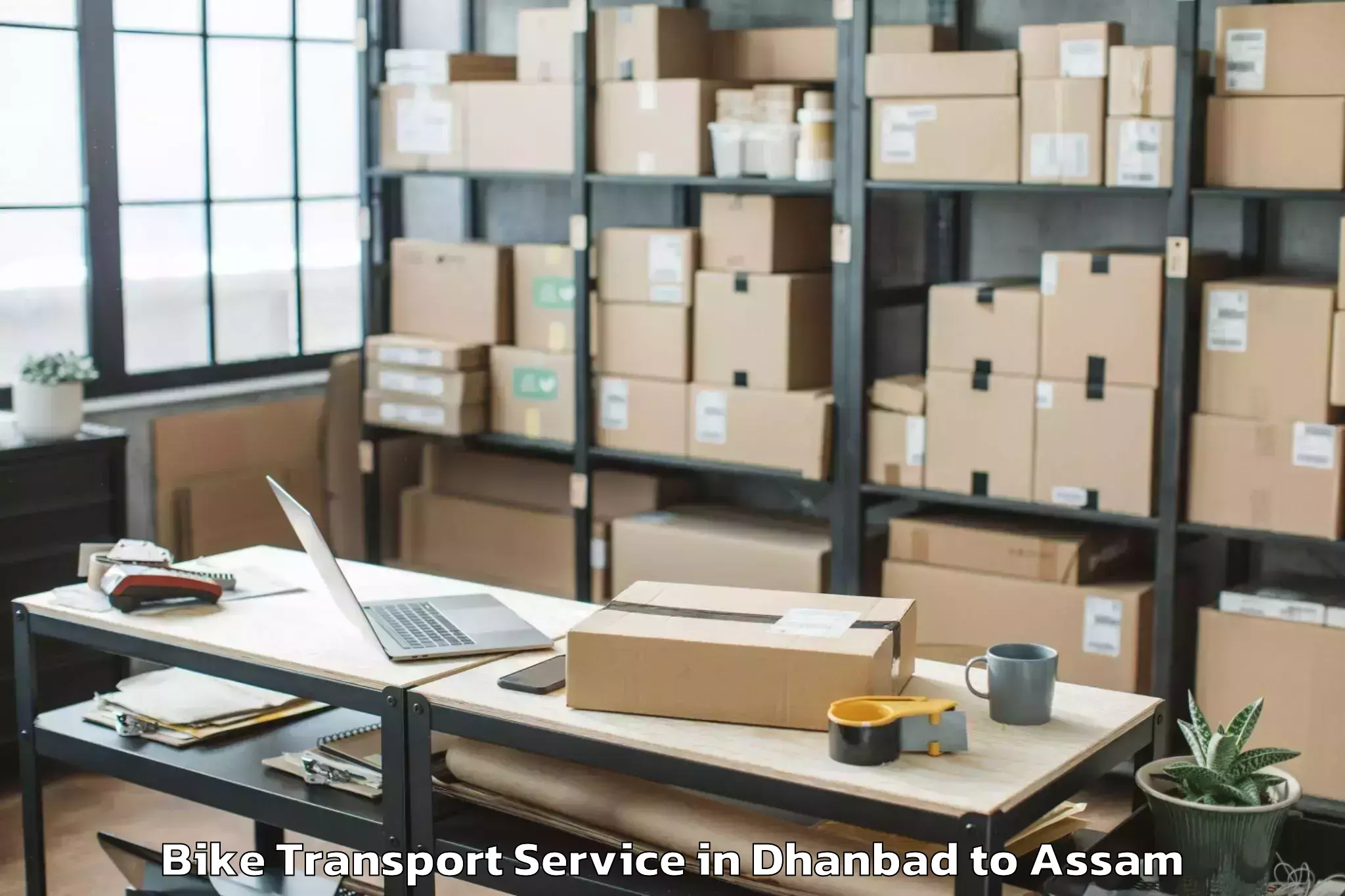 Trusted Dhanbad to Golakganj Bike Transport